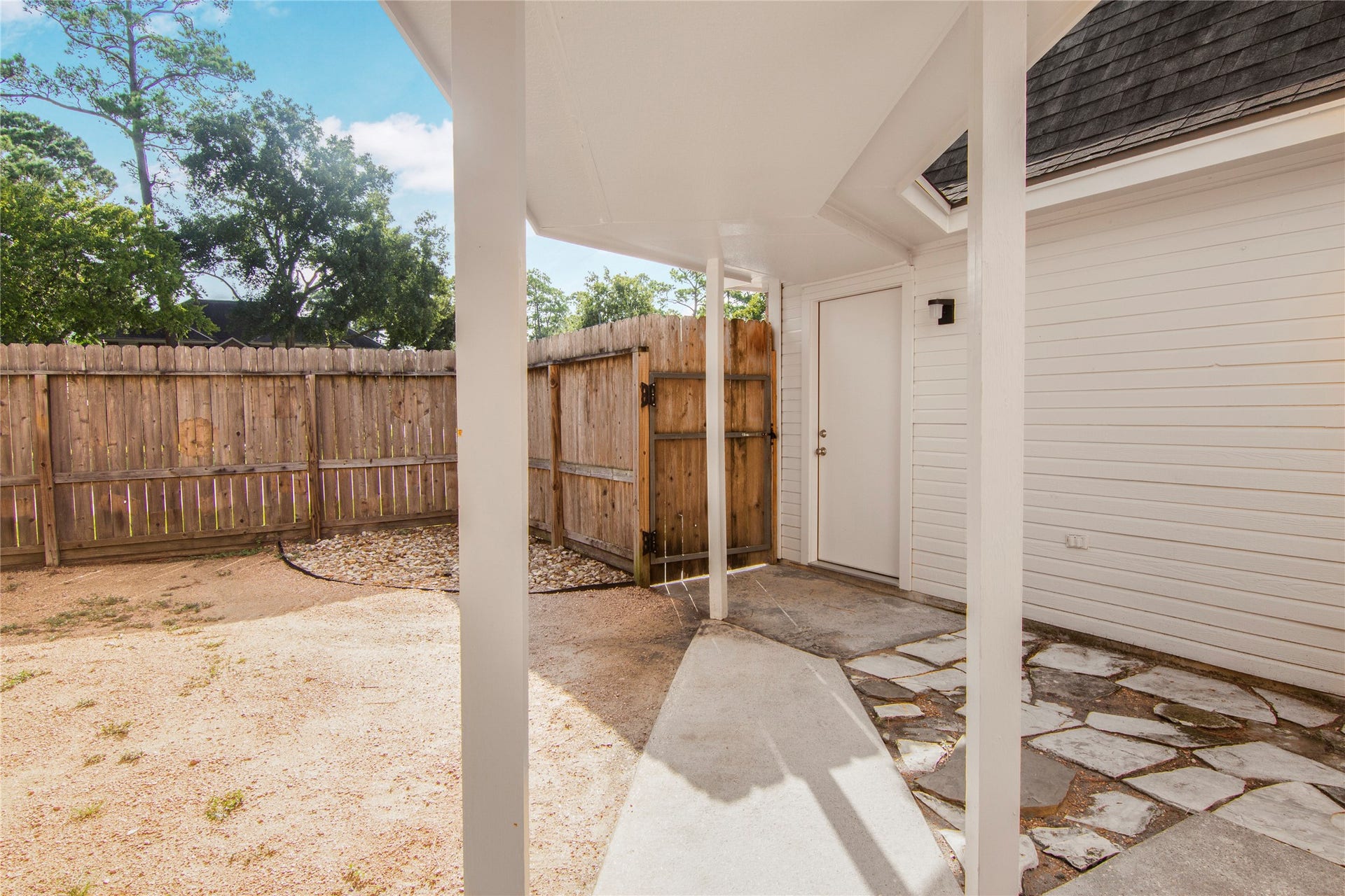 12503 Oakcroft Drive, Houston, TX 77070 covered walkway from kitchen to detached garage