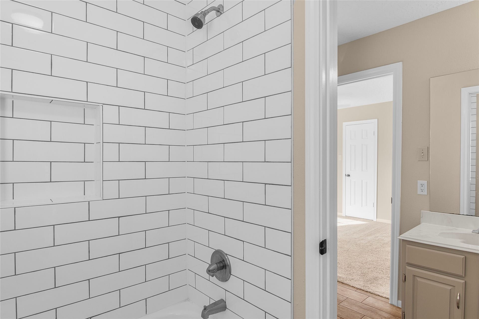 12503 Oakcroft Drive, Houston, TX 77070 the updated shower and facilities have its own door separating its use from the vanity