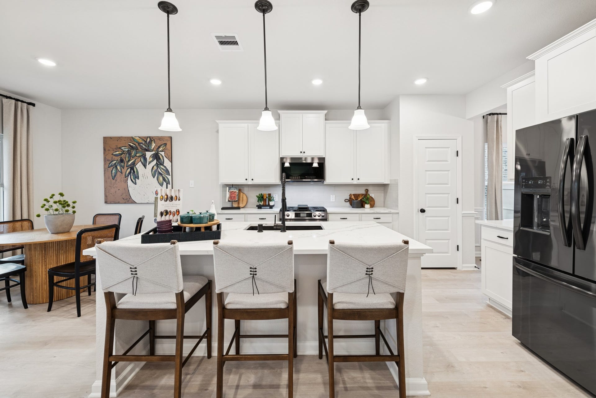 8914 Adana Drive, Montgomery, TX 77316 The Princeton II- Kitchen and Breakfast Area. Staged model home shown for illustration only; actual features, colors, and upgrades may vary.