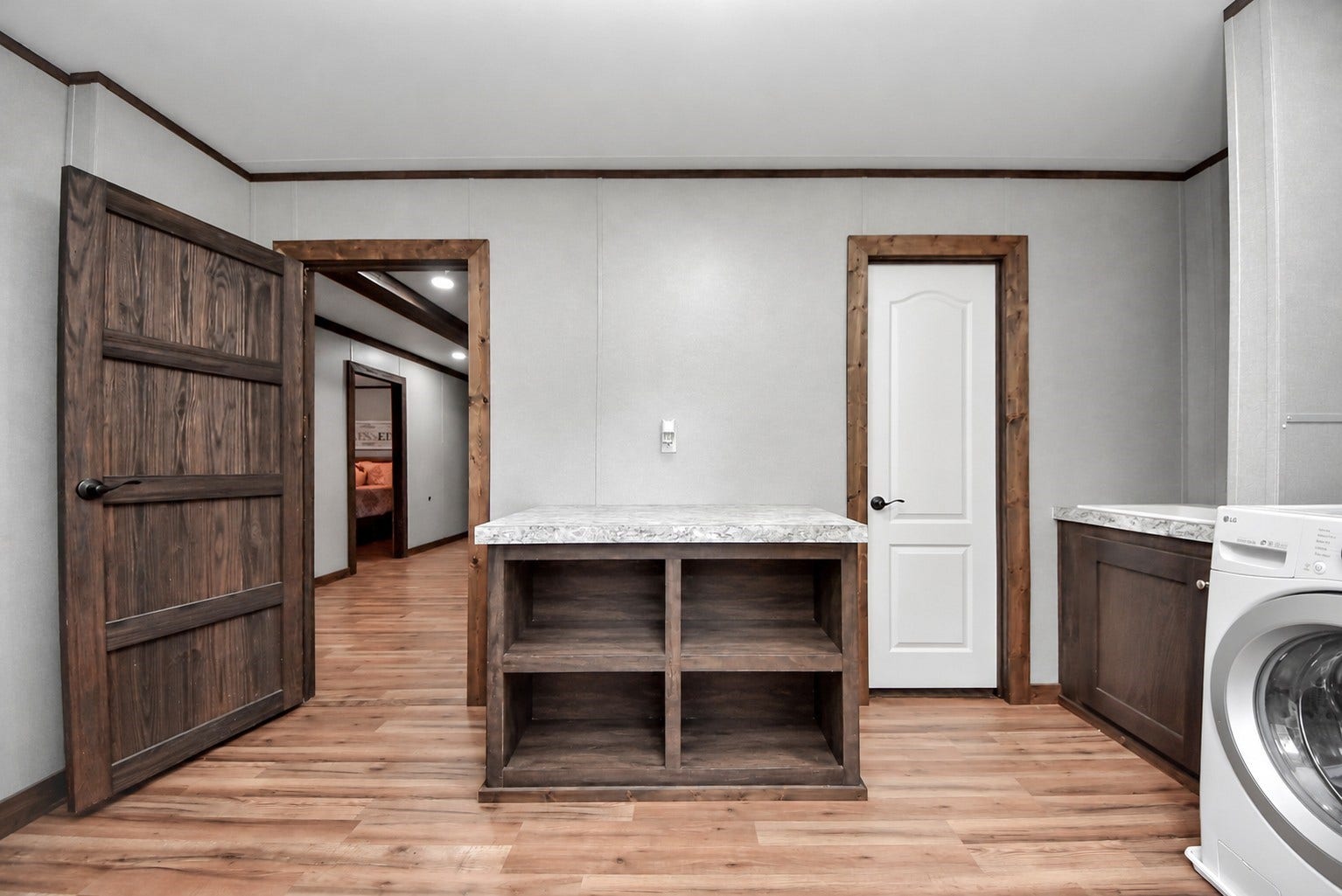 12565 Royal Green Drive, Conroe, TX 77303 Another angle highlighting the spacious layout, built-in storage, and countertop workspace.