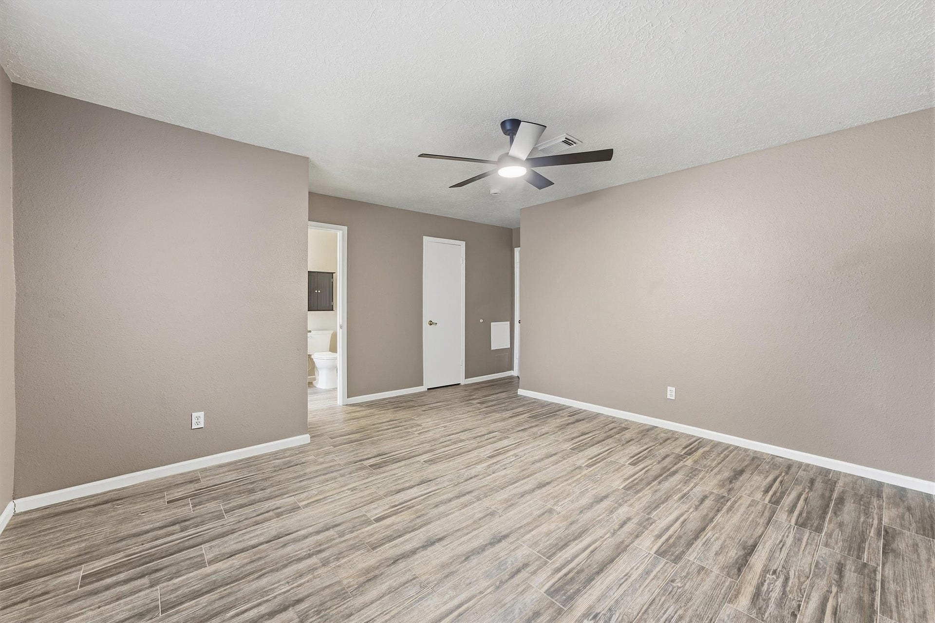 Primary suite features large walk in closet