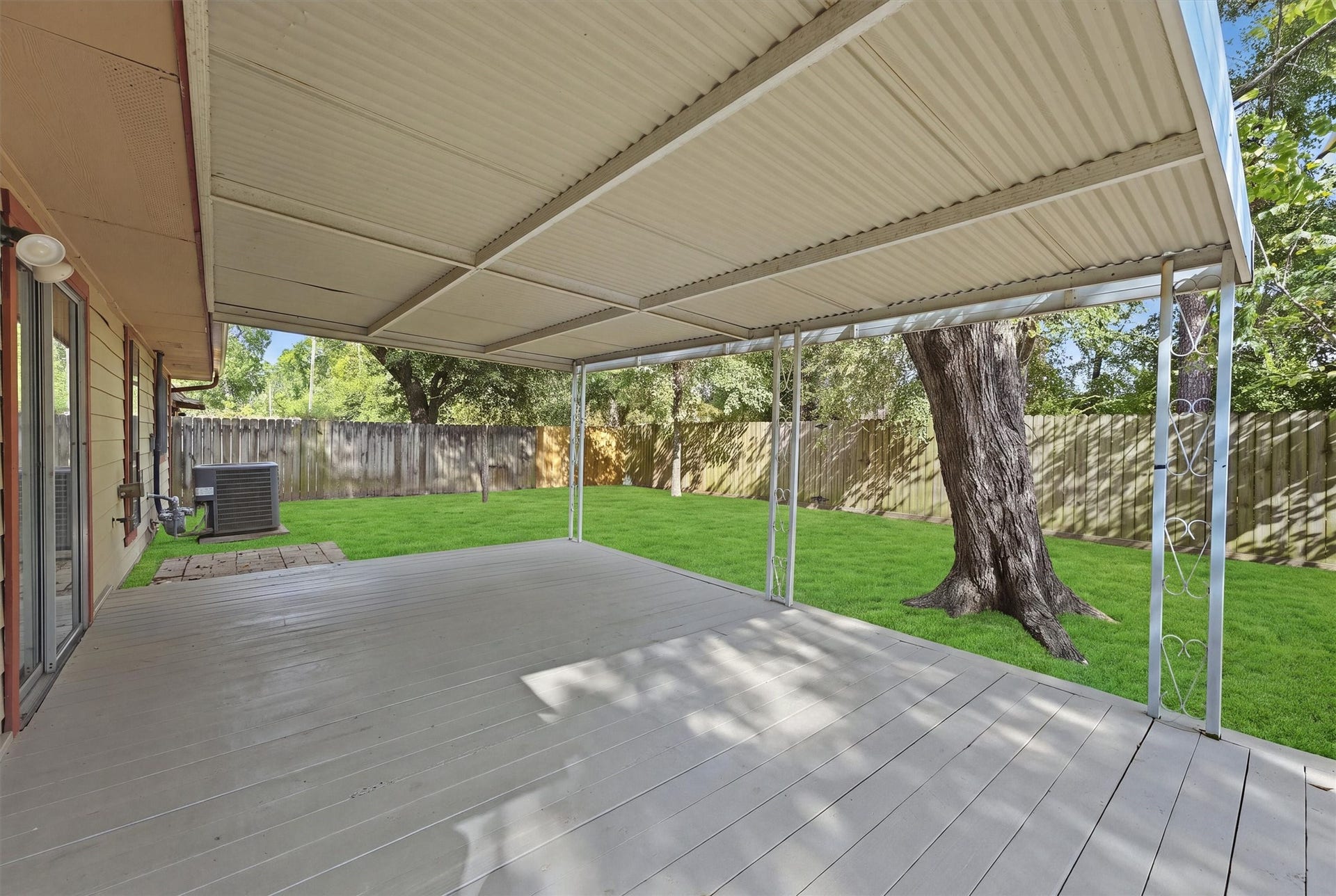 LARGE covered patio with all new wood decking
