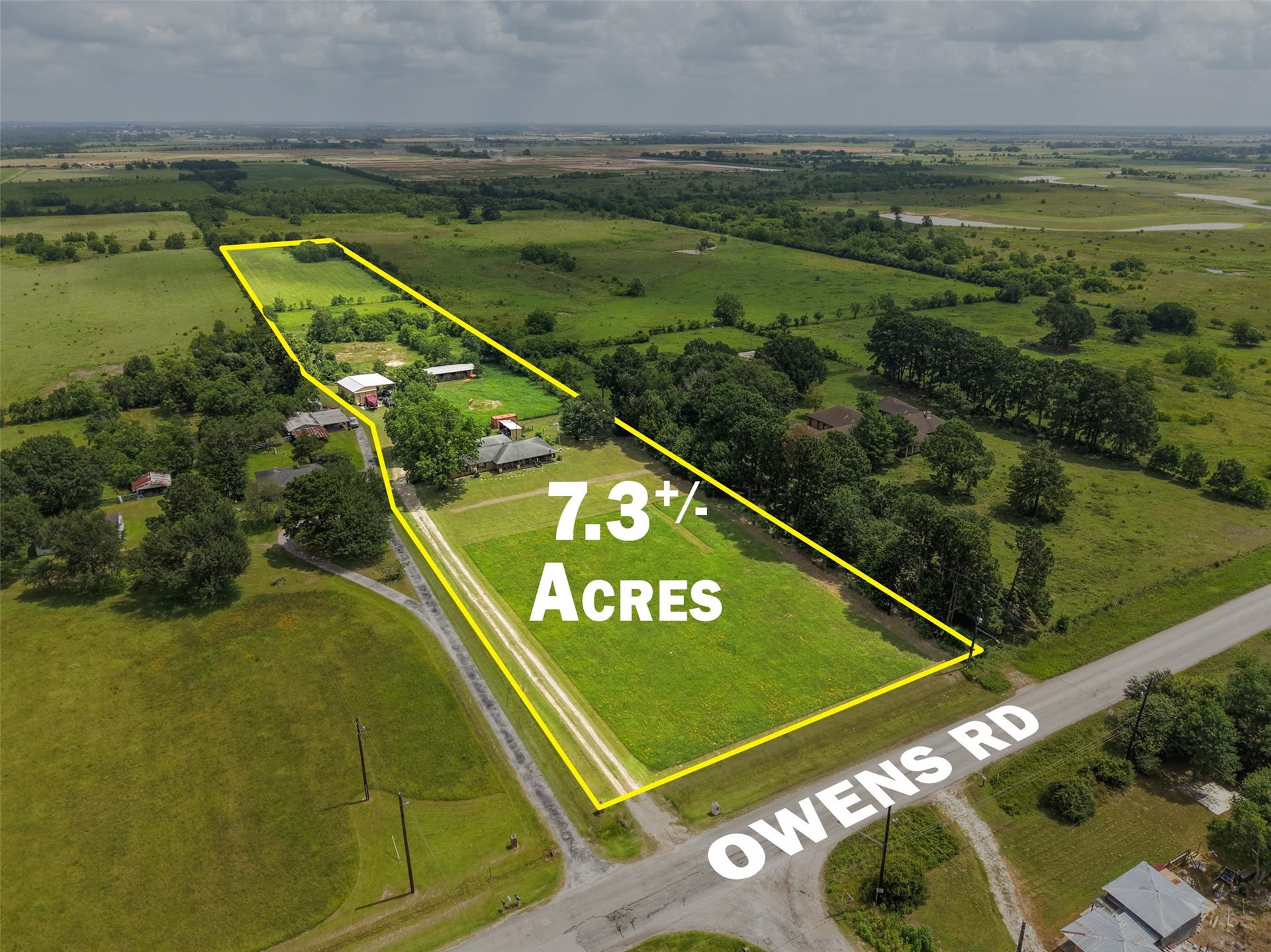 34366 Owens Road, Hempstead, TX 77445 Aerial view of the 7.3-acre tract, illustrating the open pasture, rural setting, and excellent potential for a homesite, ranch, or recreational use