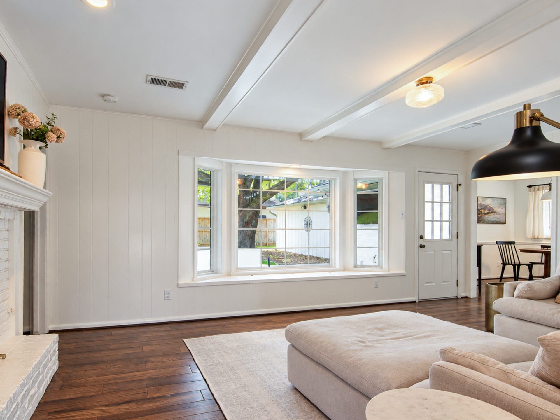 5611 Cheena Drive, Houston, TX 77096 Open living space with natural lighting and a view of the backyard.