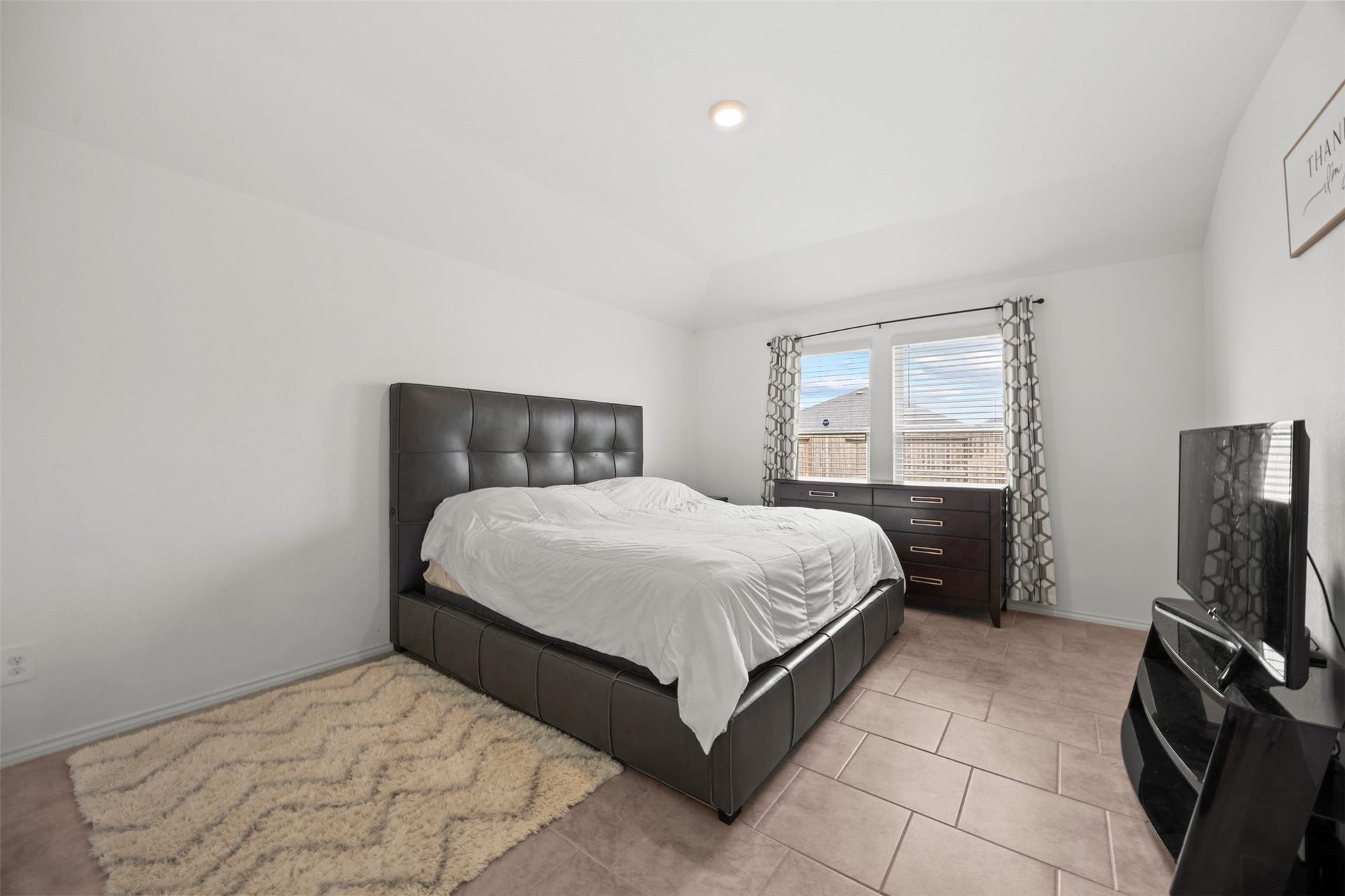 7511 Carson Court, Rosharon, TX 77583 Your own peaceful retreat! The generously sized primary bedroom offers room to relax and recharge.