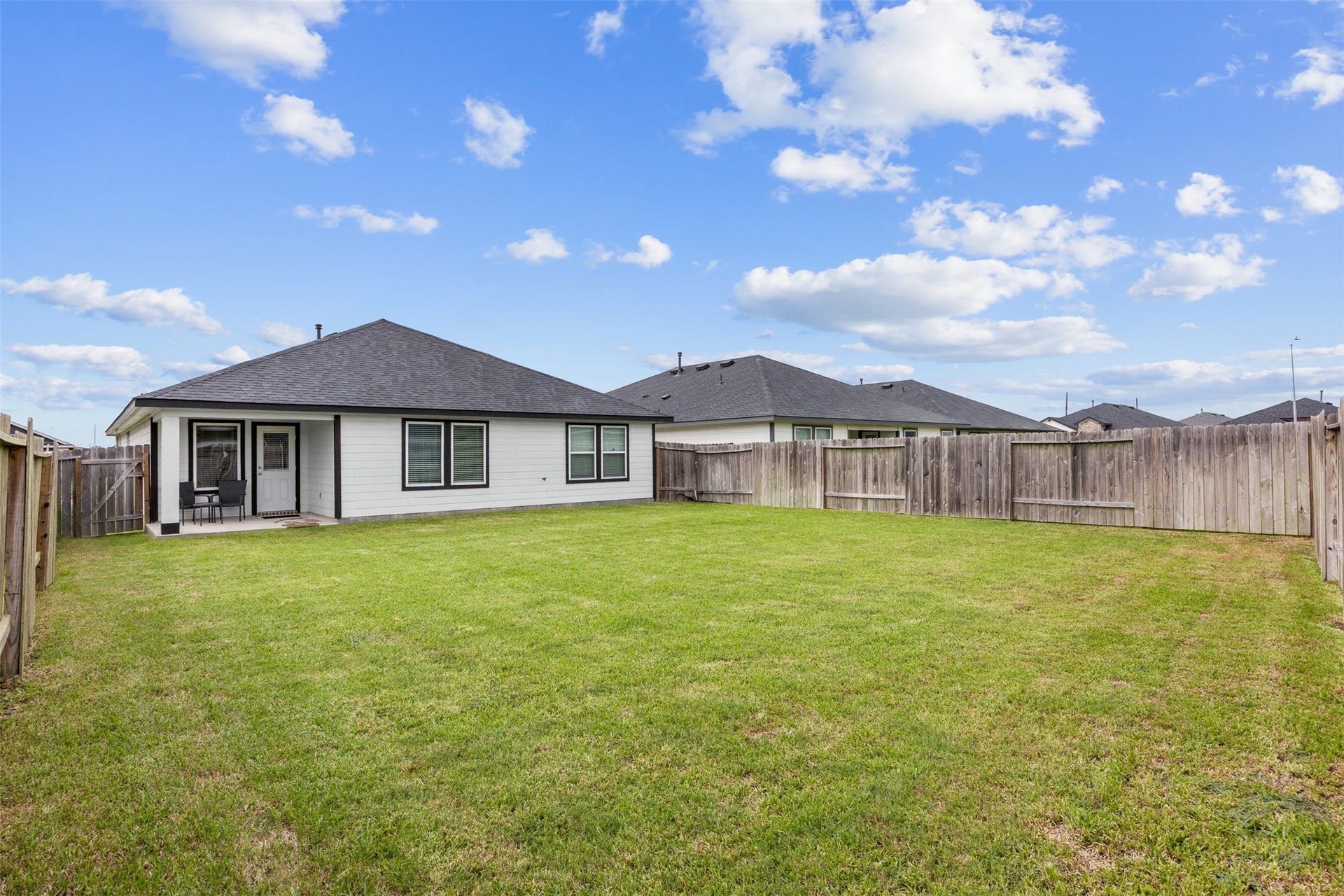 7511 Carson Court, Rosharon, TX 77583 Room to enjoy the outdoors! This spacious backyard offers endless possibilities for recreation, entertaining, or gardening.