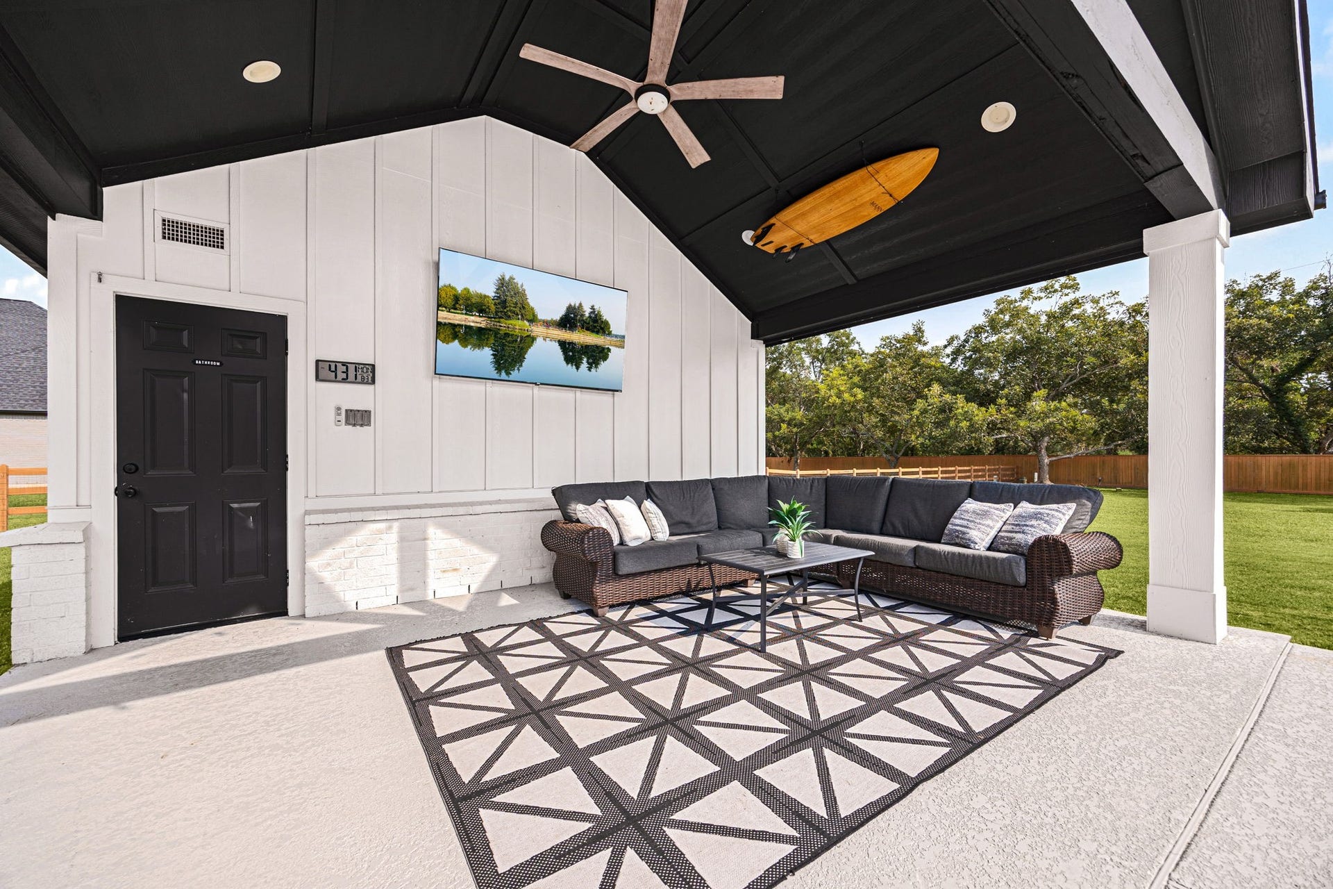 29559 Fulshear Lake Trace, Fulshear, TX 77406 Covered cabana offers a relaxing place to unwind, watch TV and enjoy the backyard. It is complete with a 1/2 bathroom as well.