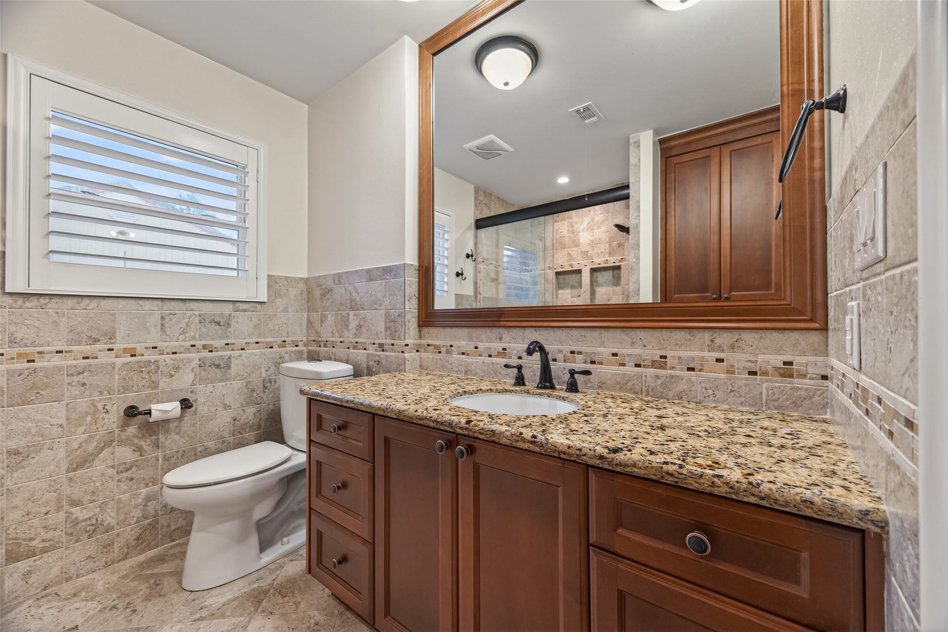 5638 Sanford Road, Houston, TX 77096 Secondary bathroom remodel thoughtfully designed with accessibility in mind.