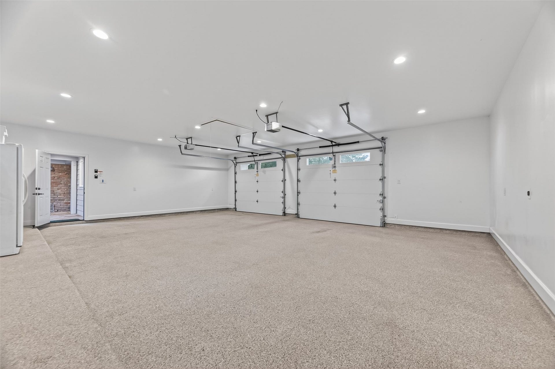 5638 Sanford Road, Houston, TX 77096 A true showpiece, the newly constructed oversized garage was designed for those who appreciate exceptional craftsmanship and versatility. Complete with a dedicated utility station featuring washer and dryer connections, a utility sink, and integrated plumbing and electrical, it's the perfect space for prized vehicles, hobbies, a workshop, home gym, or the ultimate man cave.