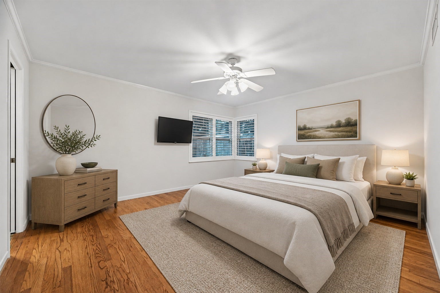 5638 Sanford Road, Houston, TX 77096 Wake up in this spacious primary retreat, where warm hardwood floors, natural light, and a calming ambiance create the perfect place to unwind. Virtually staged to help envision the space.