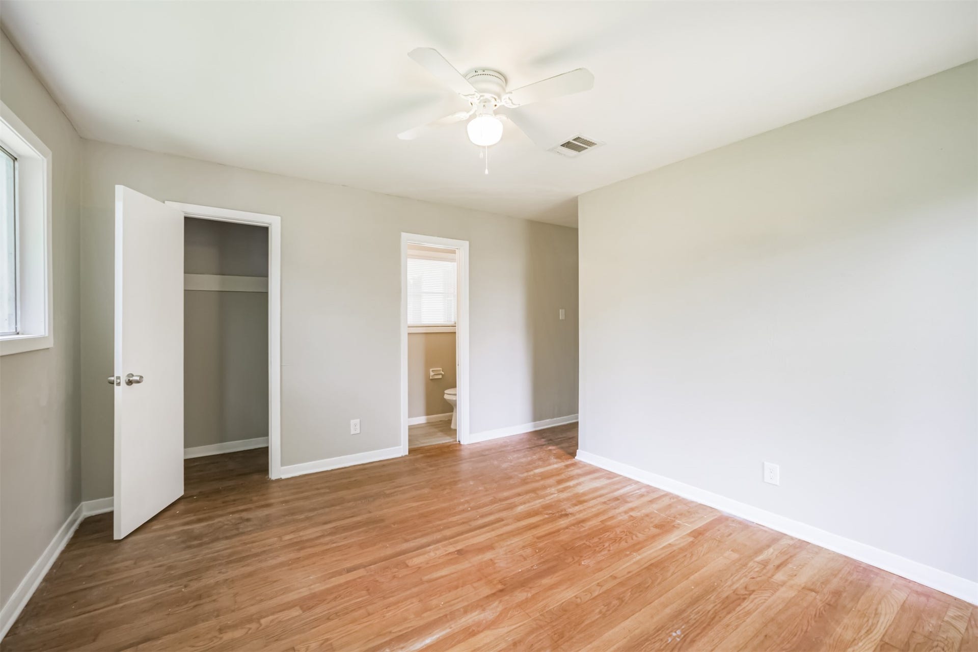 Primary bedroom has half bath and large closet