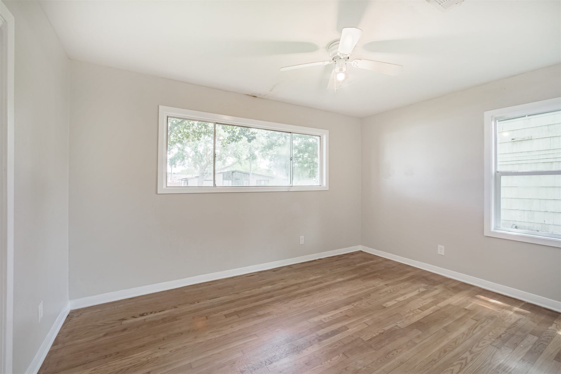 Bed 2 - Hardwood floor and ceiling fan