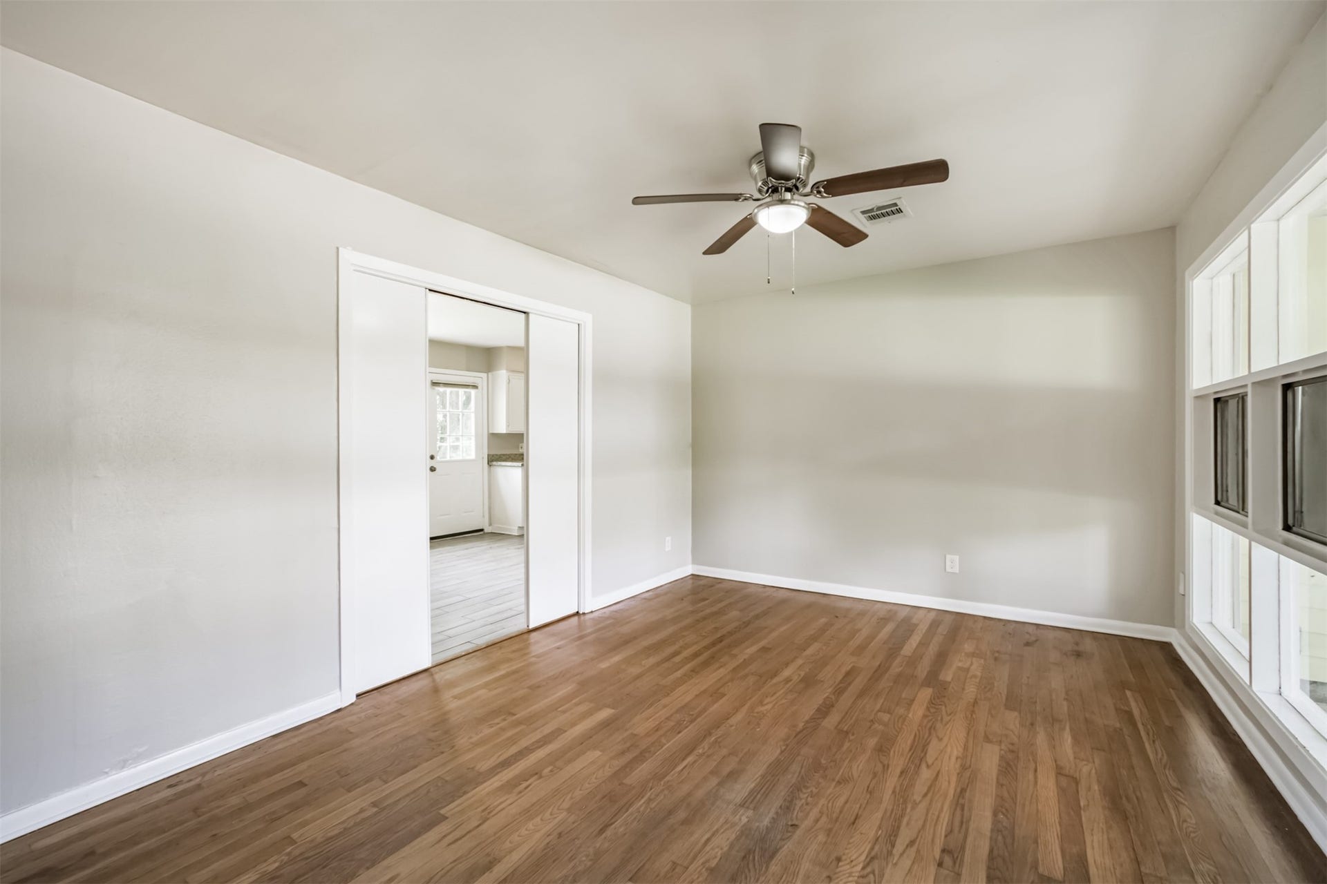 Living room has pocket doors for privacy!