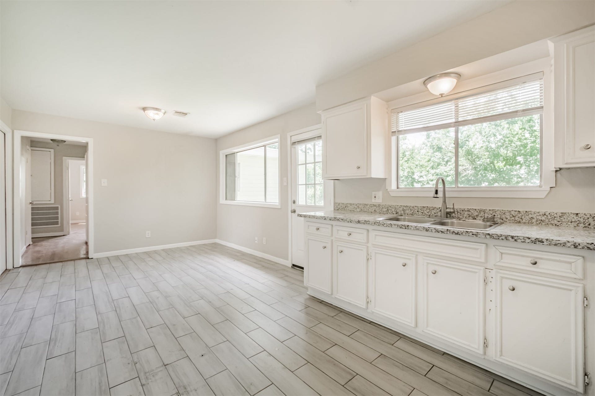 Kitchen opens to dining room