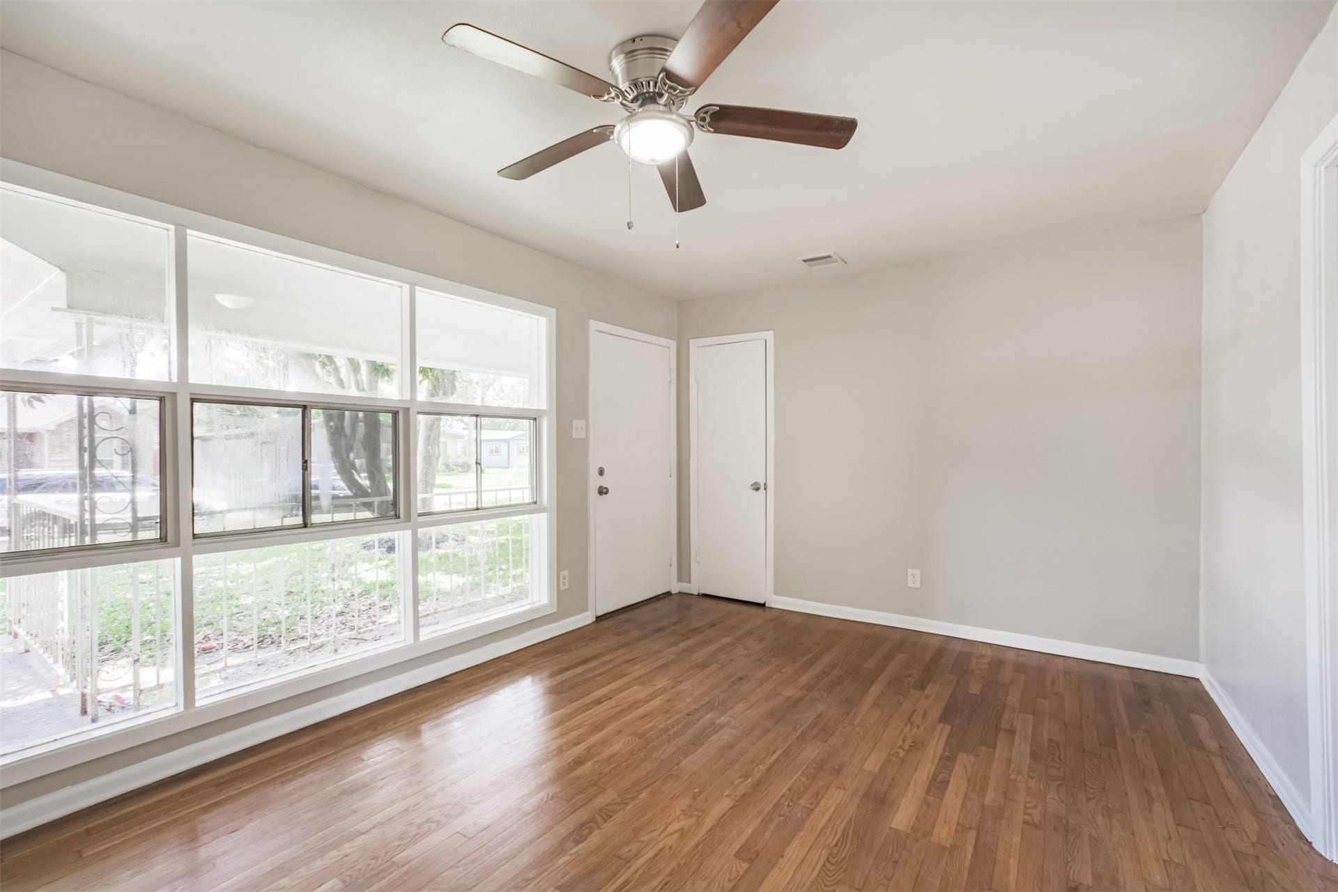 Hardwoods and tons of natural light in the living room