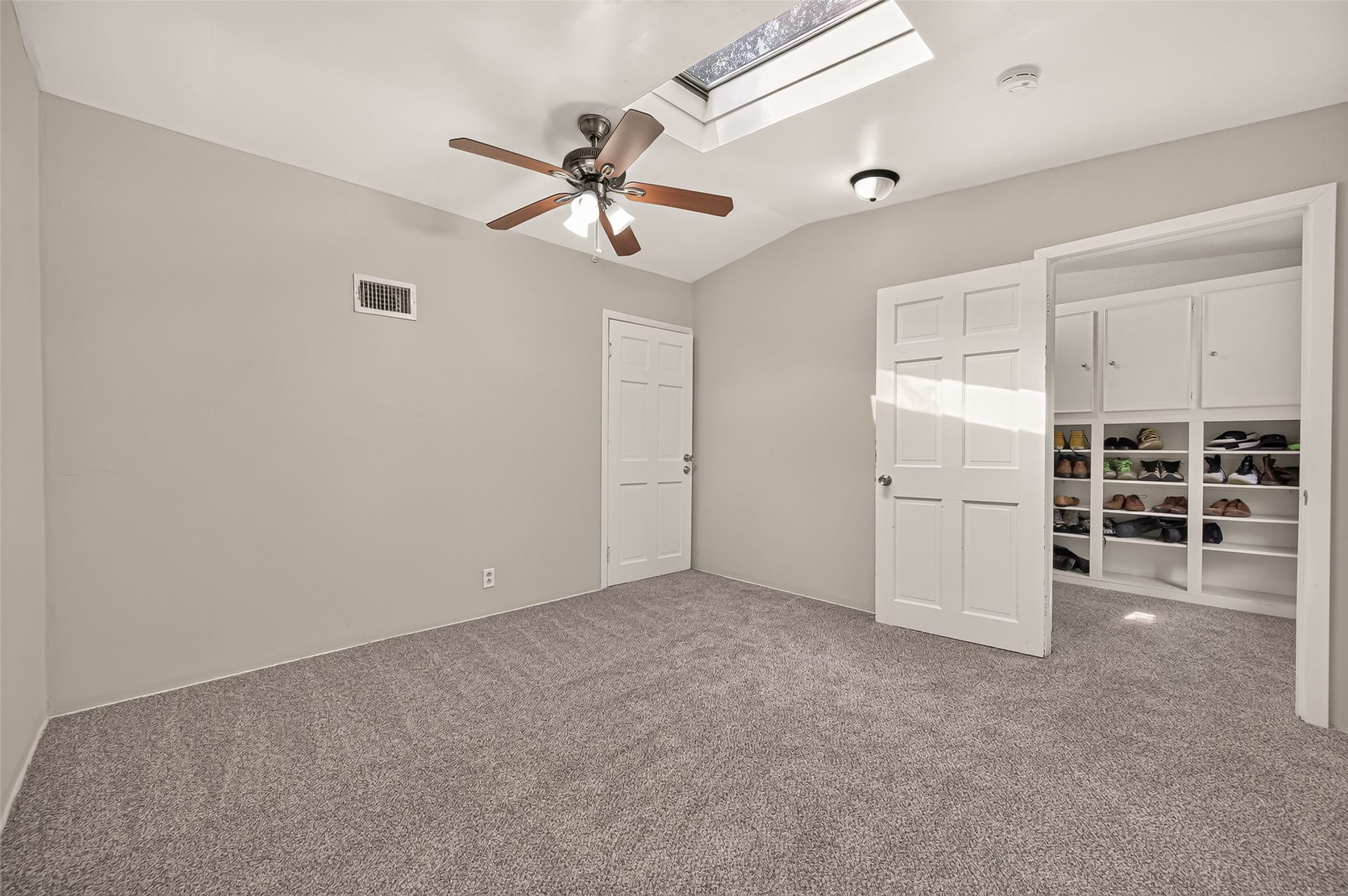 8007 Vickridge Lane, Spring, TX 77379 Charming flex space off the primary suite with a skylightideal for a nursery, home office, or workout room