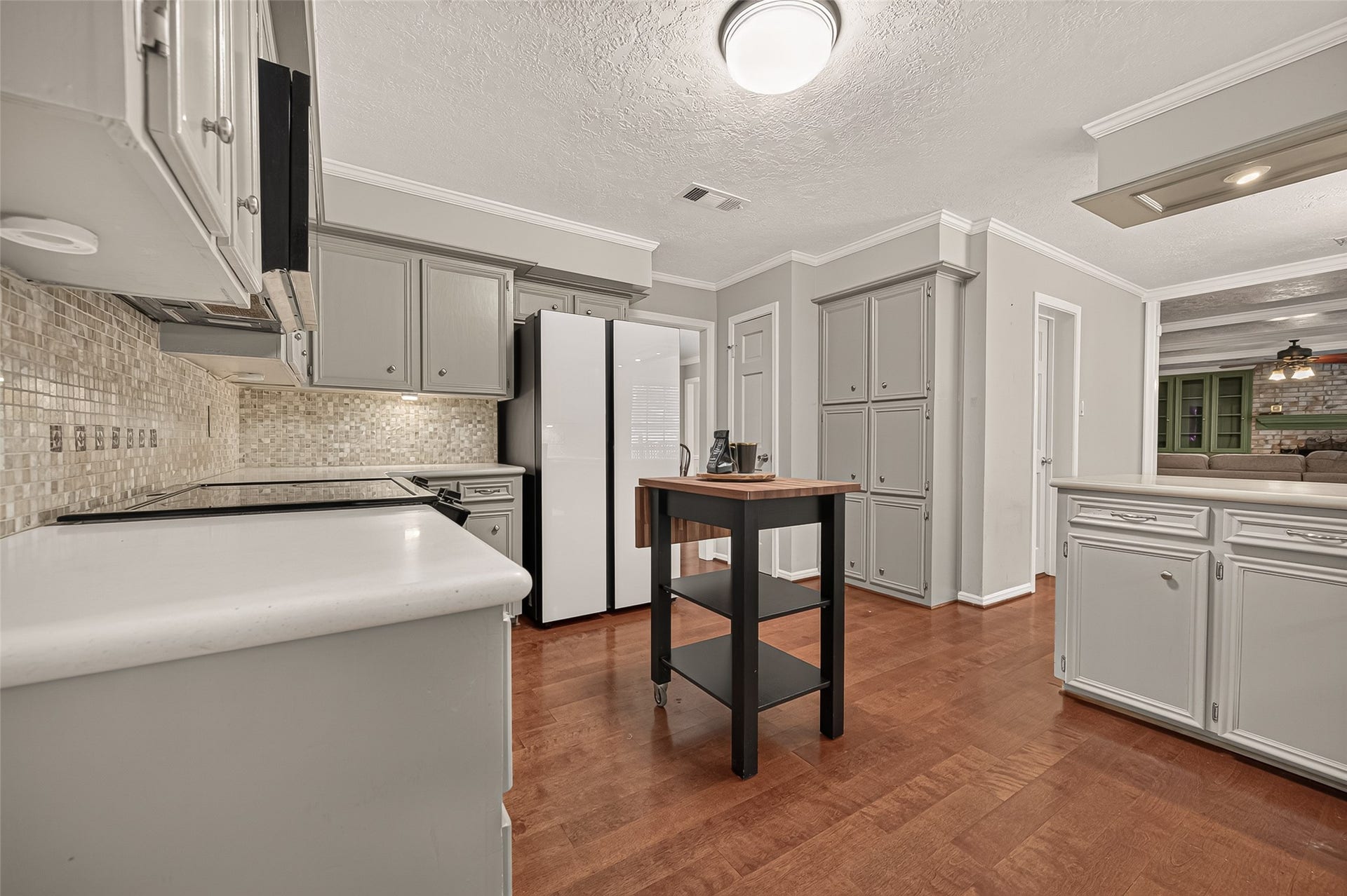 8007 Vickridge Lane, Spring, TX 77379 A spacious kitchen designed for everyday convenience, with extensive cabinetry, a large pantry, and an easy connection to the adjoining dining area