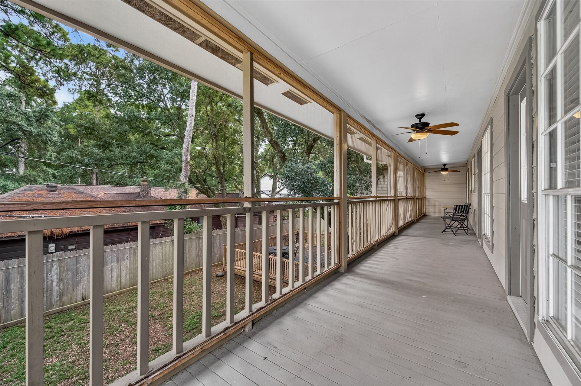 8007 Vickridge Lane, Spring, TX 77379 Screened balcony runs the length of the back of the house
