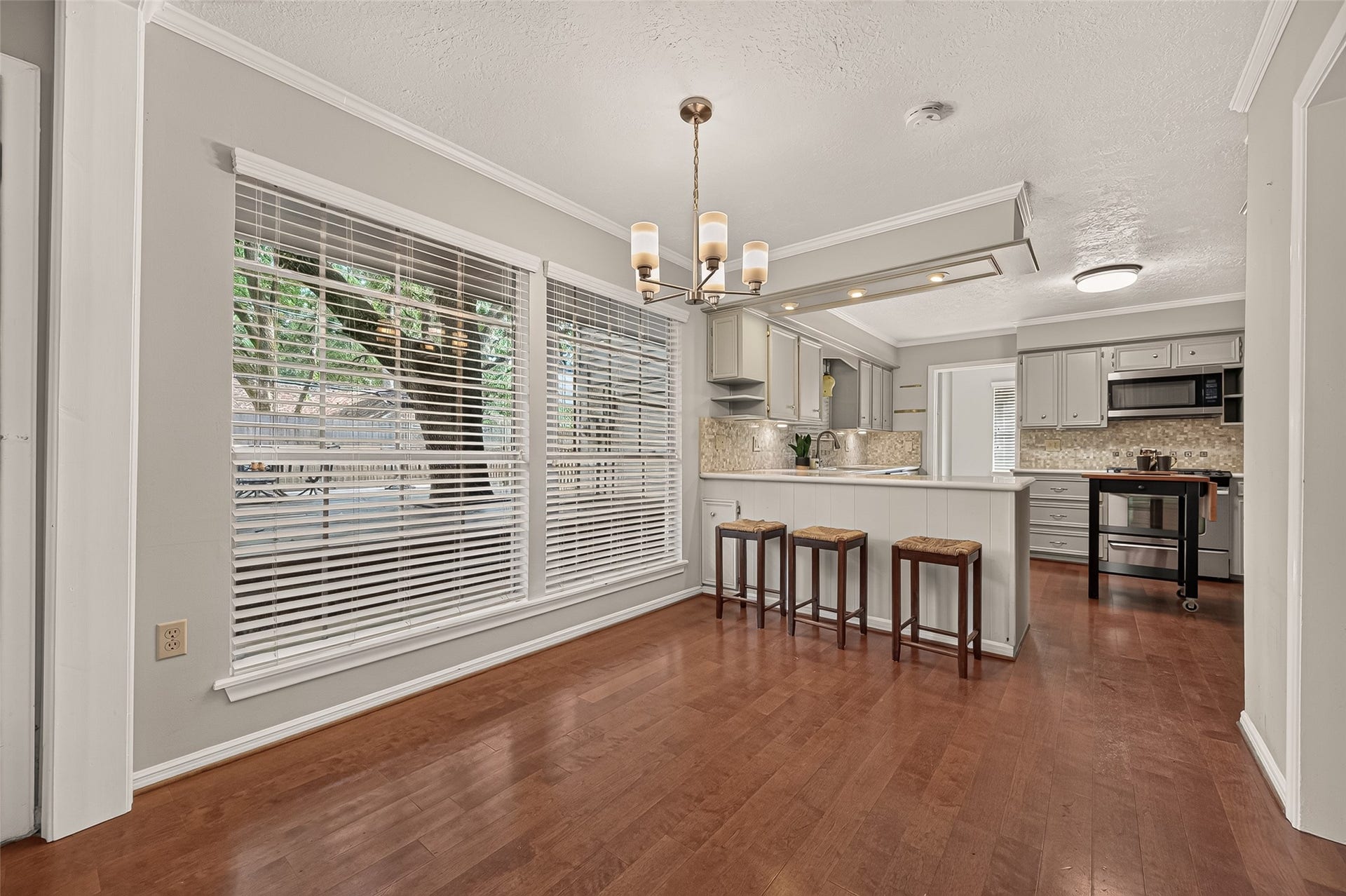 8007 Vickridge Lane, Spring, TX 77379 A welcoming breakfast area filled with natural light, offering a comfortable spot for morning coffee, casual meals, and easy conversation