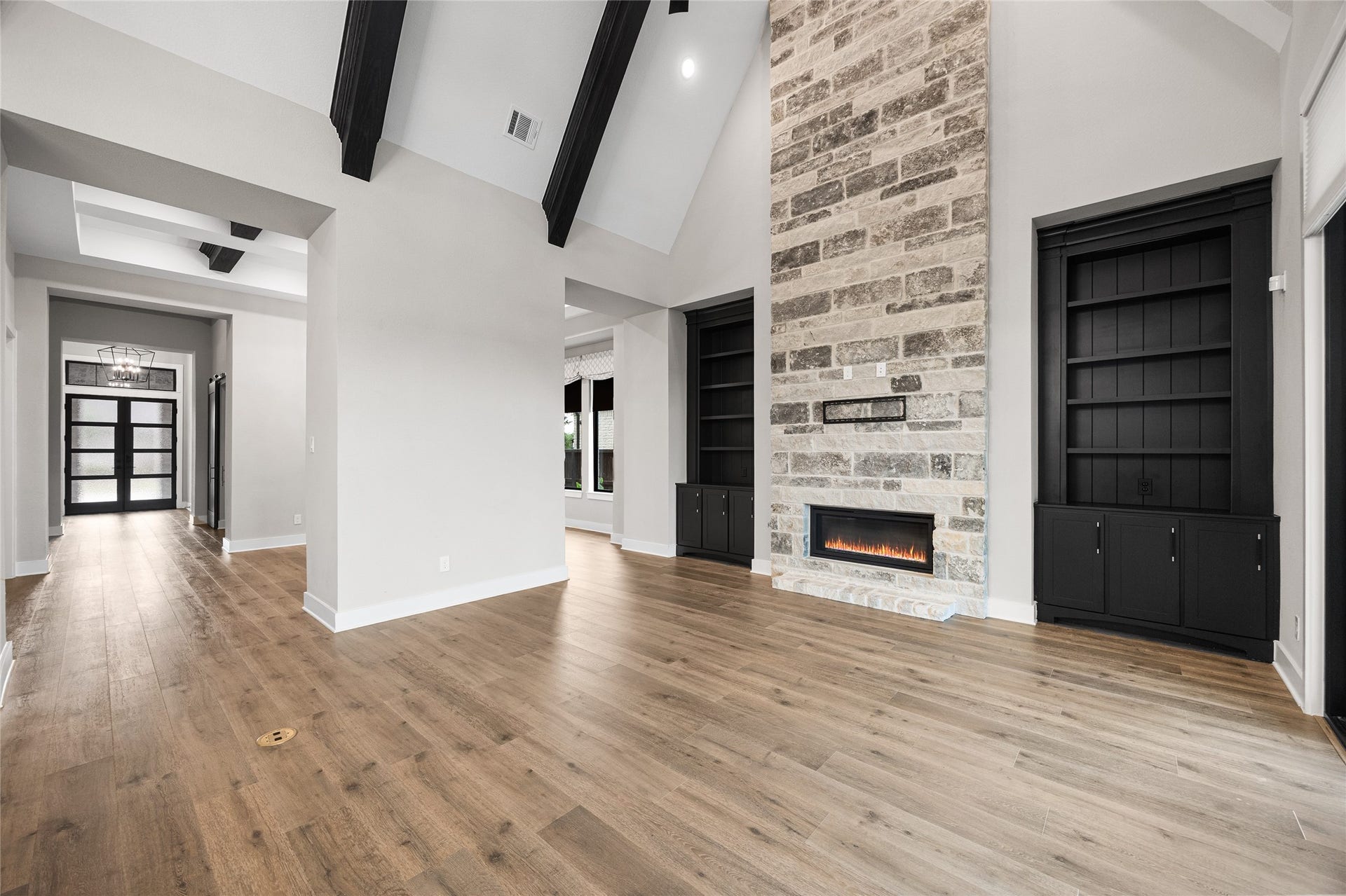 6707 Nimitz Court, Katy, TX 77493 Thoughtfully designed open layout offering clear sightlines from the entry through the main living areas, highlighting architectural detail and natural light.