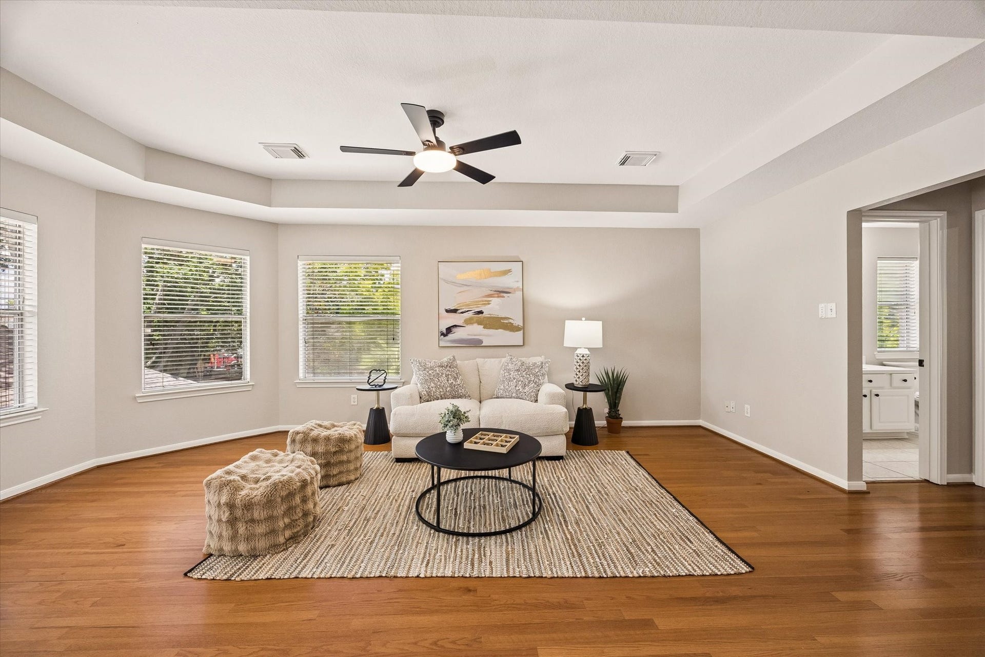 7535 Guinevere Drive, Sugar Land, TX 77479 A spacious upstairs game room with tray ceiling is the perfect space for movie nights, a play area, home office, or additional living space. Upstairs is all wood too (except bathrooms)