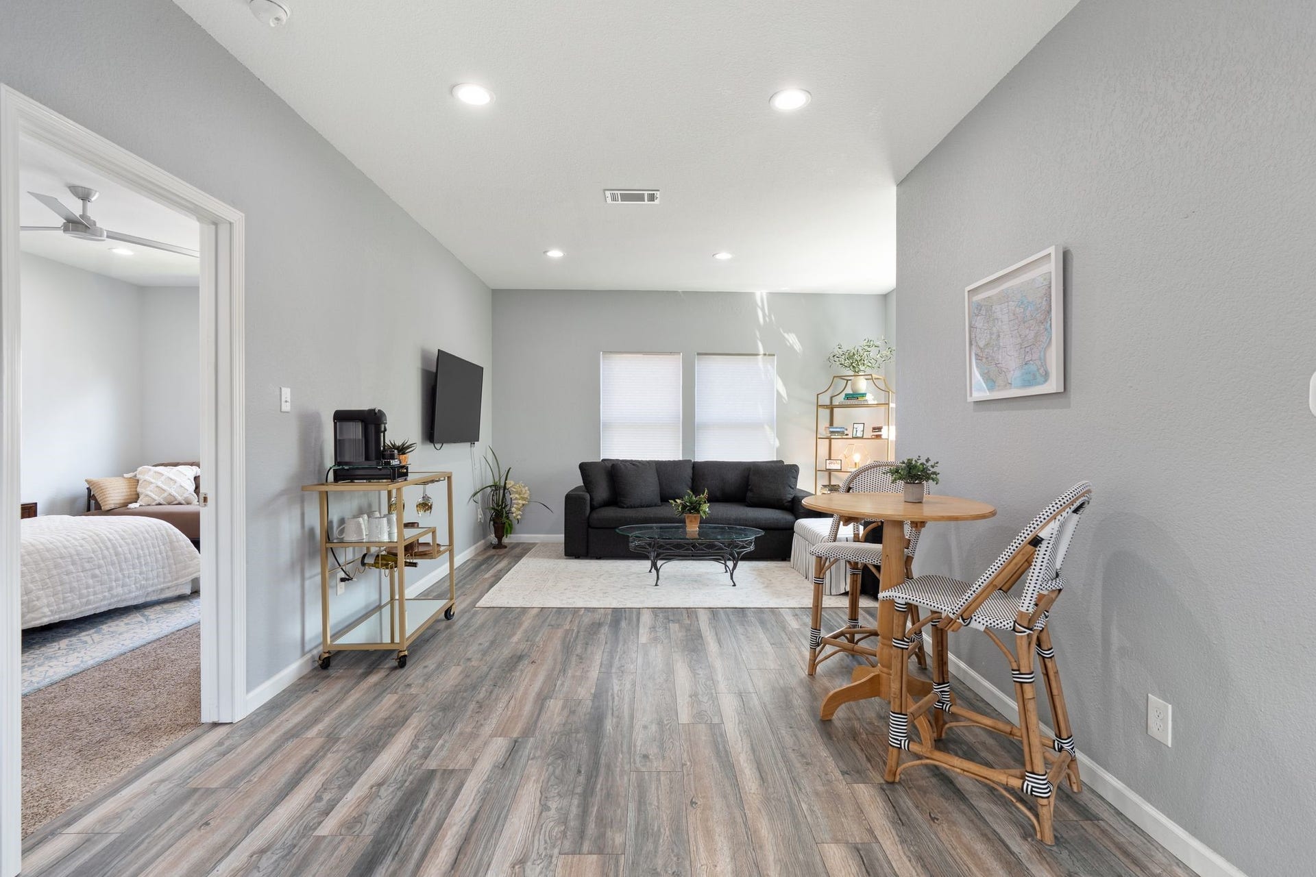 919 Ashland Street, #A, Houston, TX 77008 Another view showcasing the garage apartments open living & kitchen areas. Recessed lighting + wonderful natural light create a bright, inviting space completely separate from the main residence. NOTE: Some furnishings in garage apartment negotiable: