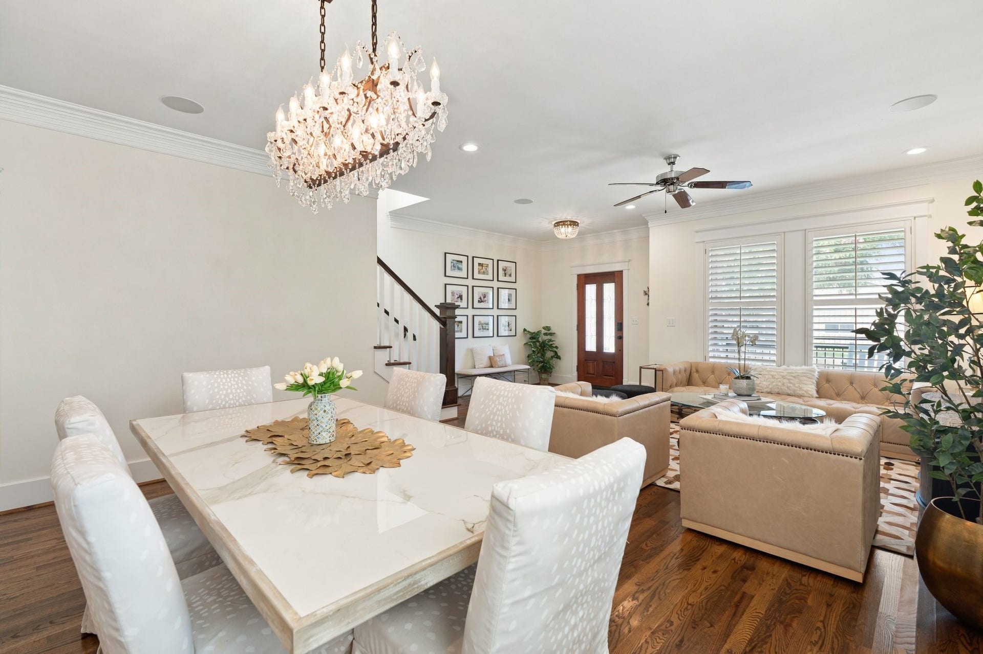 919 Ashland Street, #A, Houston, TX 77008 Spacious dining room w/ beautiful Restoration Hardware chandelier, refinished hardwood floors + 2 large windows w/ plantation shutters. Open connection to the living room makes this space ideal for dinner parties & effortless entertaining!