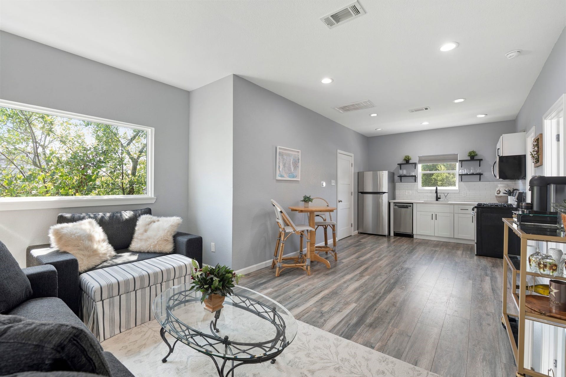 919 Ashland Street, #A, Houston, TX 77008 Incredible fully equipped GARAGE APARTMENT built 1920! Separate from the main home - offers an additional 700+ sq ft beyond the main home's 2,232 sq ft. The garage apartment offers its own living area, kitchen, bedroom, full bath + stackable washer & dryer. These spaces provide flexibility: ideal for guests, a home office or additional living space!