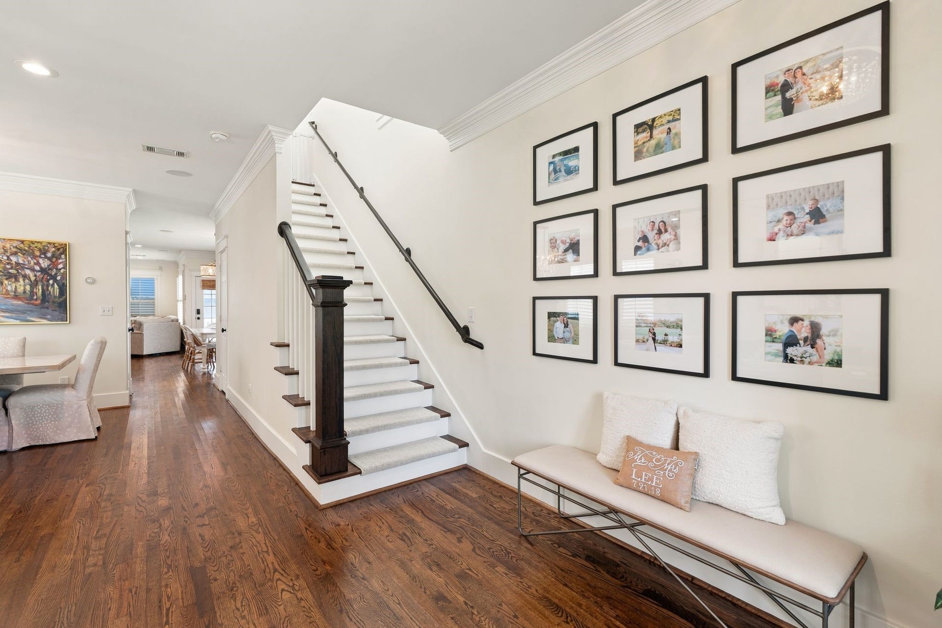 919 Ashland Street, #A, Houston, TX 77008 The welcoming entry opens to the living & dining rooms w/ staircase leading to the 2nd floor. Decorative light fixture + space for a console table & art create an inviting first impression. The hallway beyond the dining room leads to the kitchen & family room.