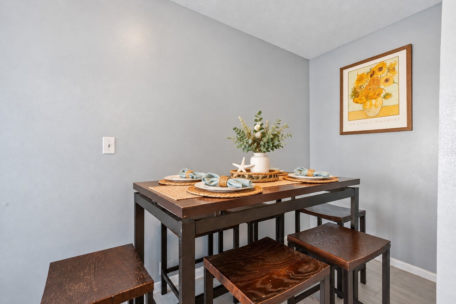 1805 19th Street, Galveston, TX 77550 Second-Floor Dining Nook: Second-floor dining area featuring seating for four and neutral coastal-inspired finishes. Conveniently located near the kitchen, this inviting space is ideal for casual dining and entertaining family or vacation guests.