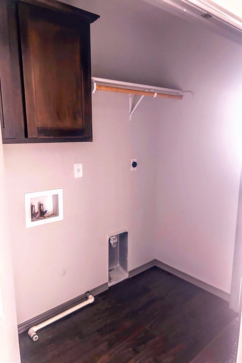 243 Green Valley Drive, Copperas Cove, TX 76522 laundry room with storage space
