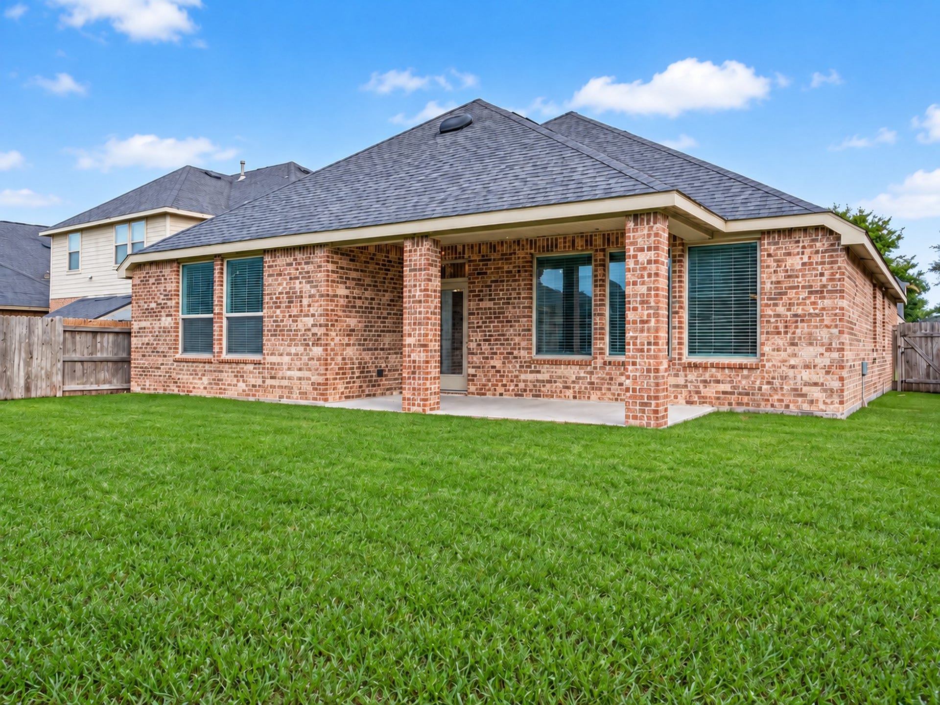 19711 Lakeside Pointe, Richmond, TX 77407 Extend your living outdoors with a covered patio overlooking a spacious, fenced backyard, offering room for gardening, outdoor games, and relaxed weekends