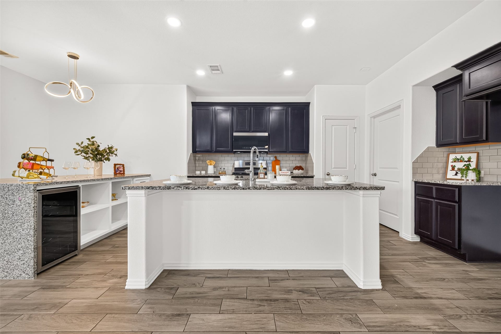 19711 Lakeside Pointe, Richmond, TX 77407 Extra kitchen cabinets, built-in trash bin under the kitchen countertop