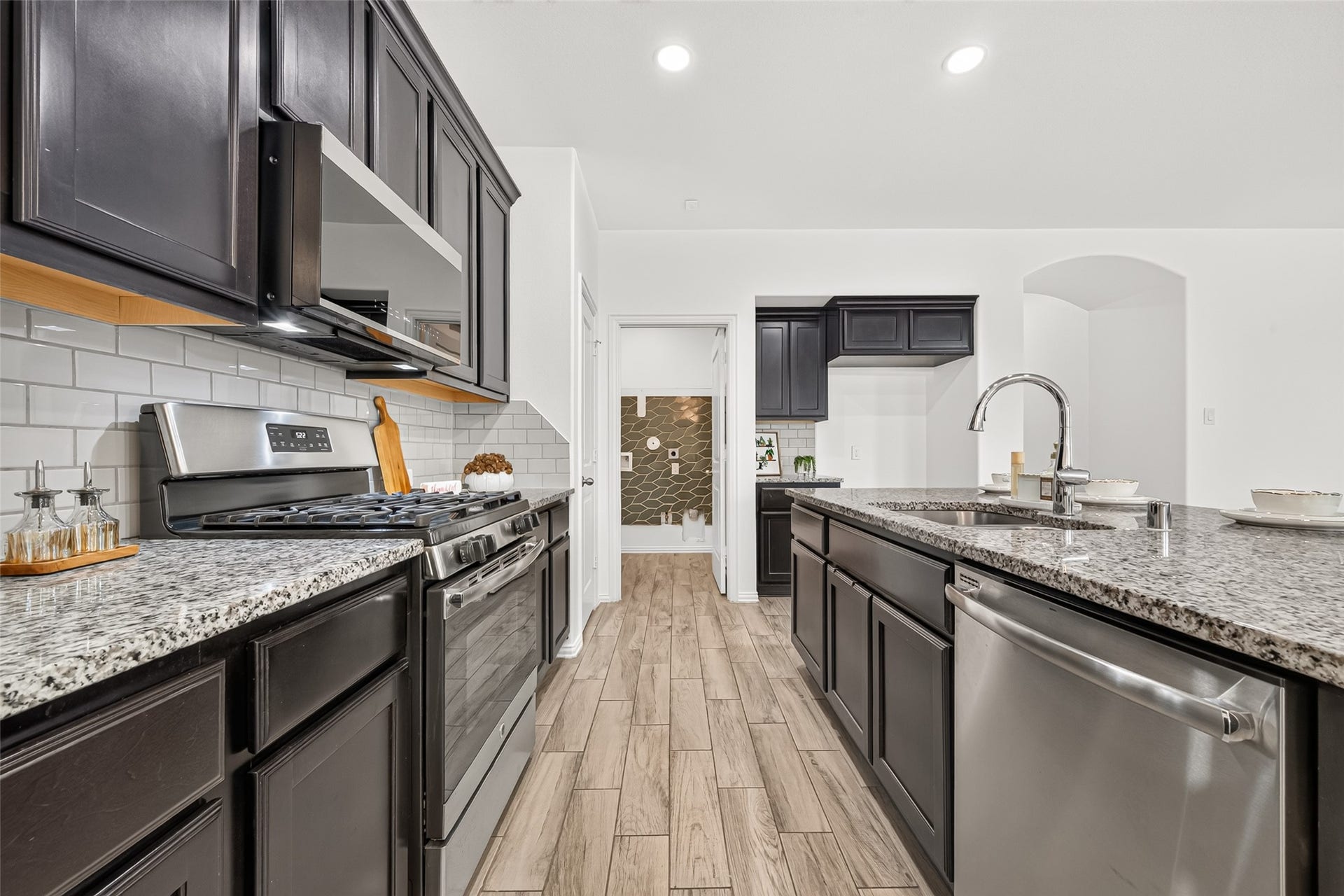 19711 Lakeside Pointe, Richmond, TX 77407 Thoughtful kitchen details include a touchscreen microwave