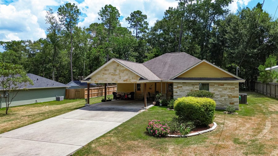 Property photo for 10910 Royal Magnolia Drive, Conroe, TX