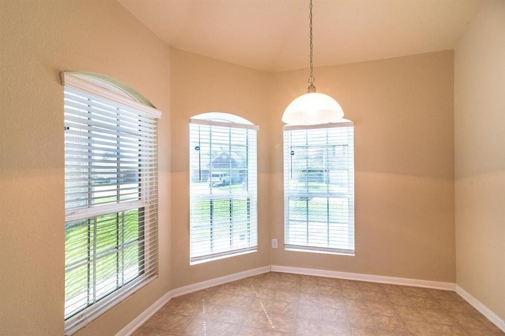 The breakfast nook looks out over the front yard