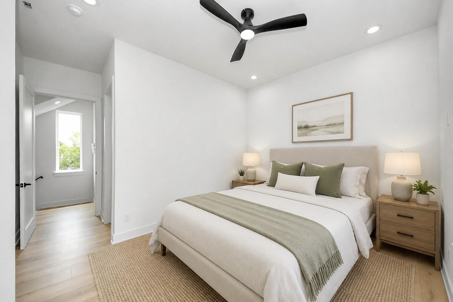 1603 W 25th Street, Houston, TX 77008 Virtually staged second bedroom located on the third floor.