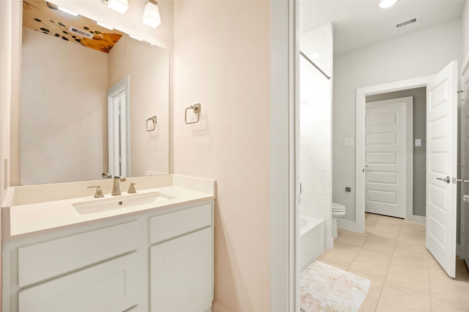 428 Horizon Light Lane, Katy, TX 77493 Bedroom 3 vanity overlooking a shared bathroom.