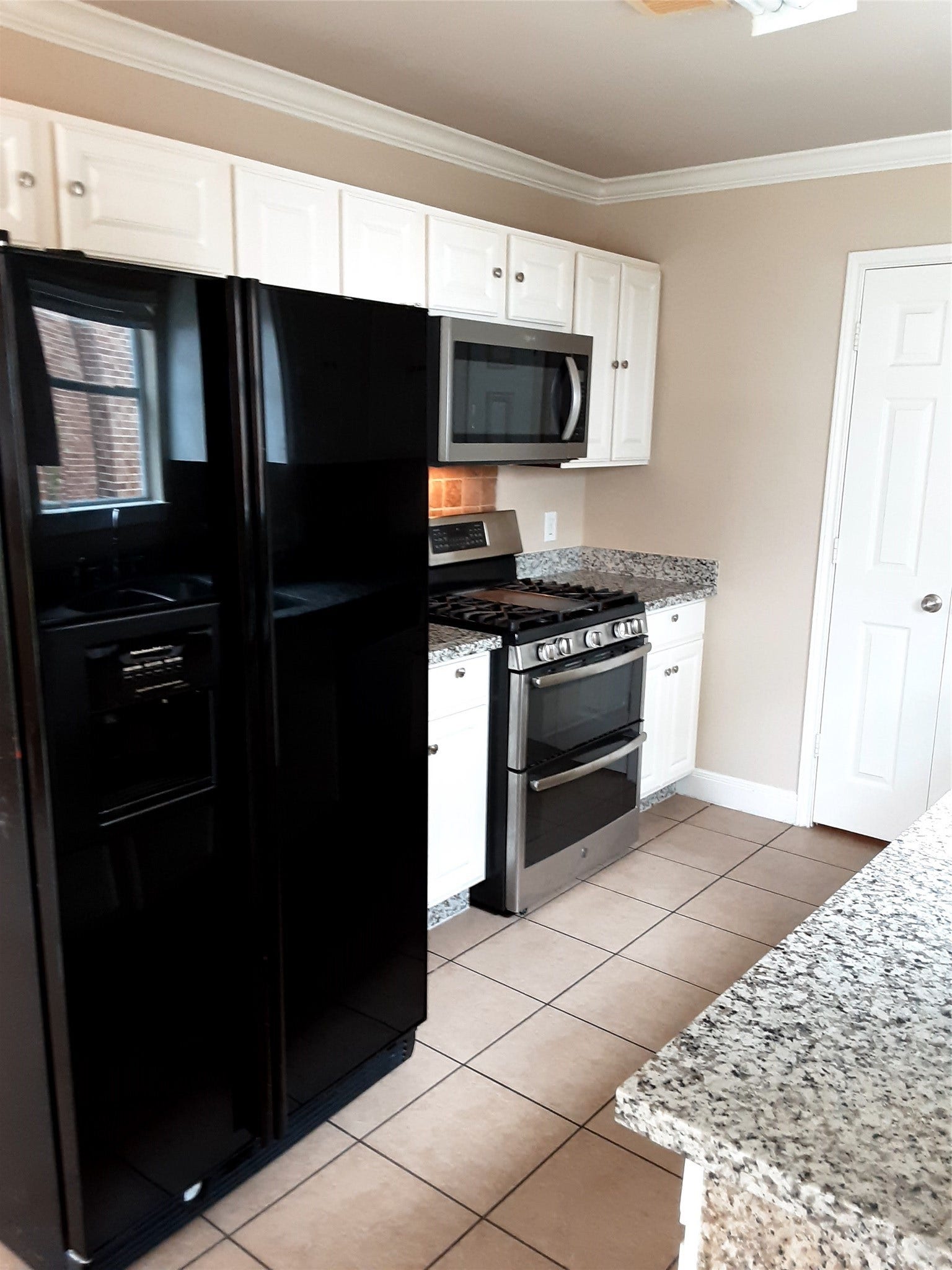 5502 Post Oak Manor Drive, Houston, TX 77085 Black Refrigerator included