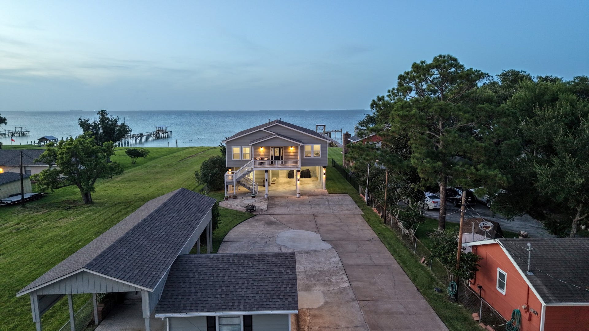 2534 Cliff Drive, San Leon, TX 77539 Perfect coastal positioning offering over half an acre of privacy along the water.