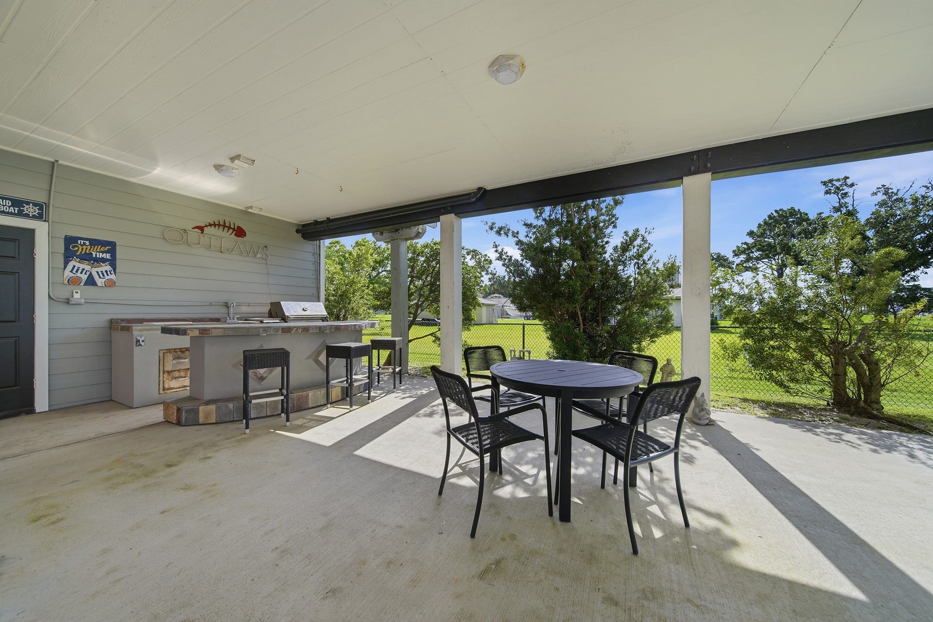 2534 Cliff Drive, San Leon, TX 77539 Fire up the grill and entertain effortlessly in your premium outdoor kitchen oasis.
