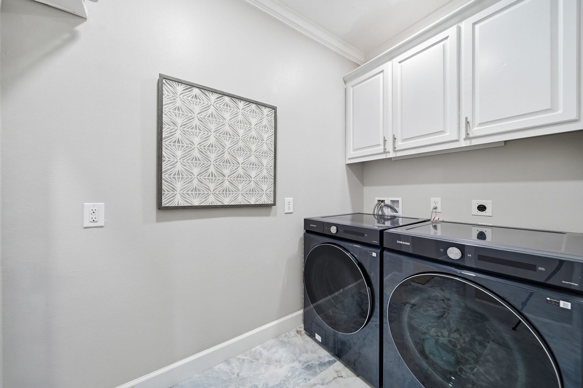 2534 Cliff Drive, San Leon, TX 77539 Enjoy the everyday convenience of a spacious, organized laundry room with built-in storage.