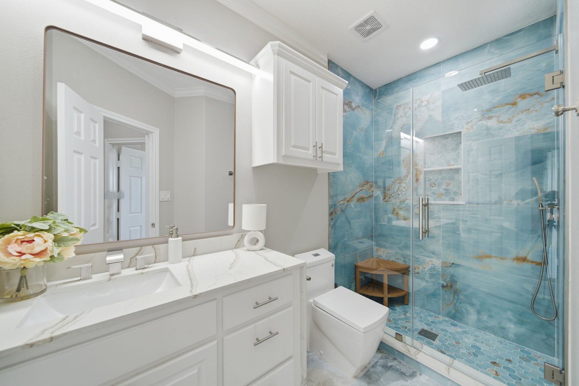 2534 Cliff Drive, San Leon, TX 77539 Immerse yourself in a beautifully curated space with premium custom tilework.