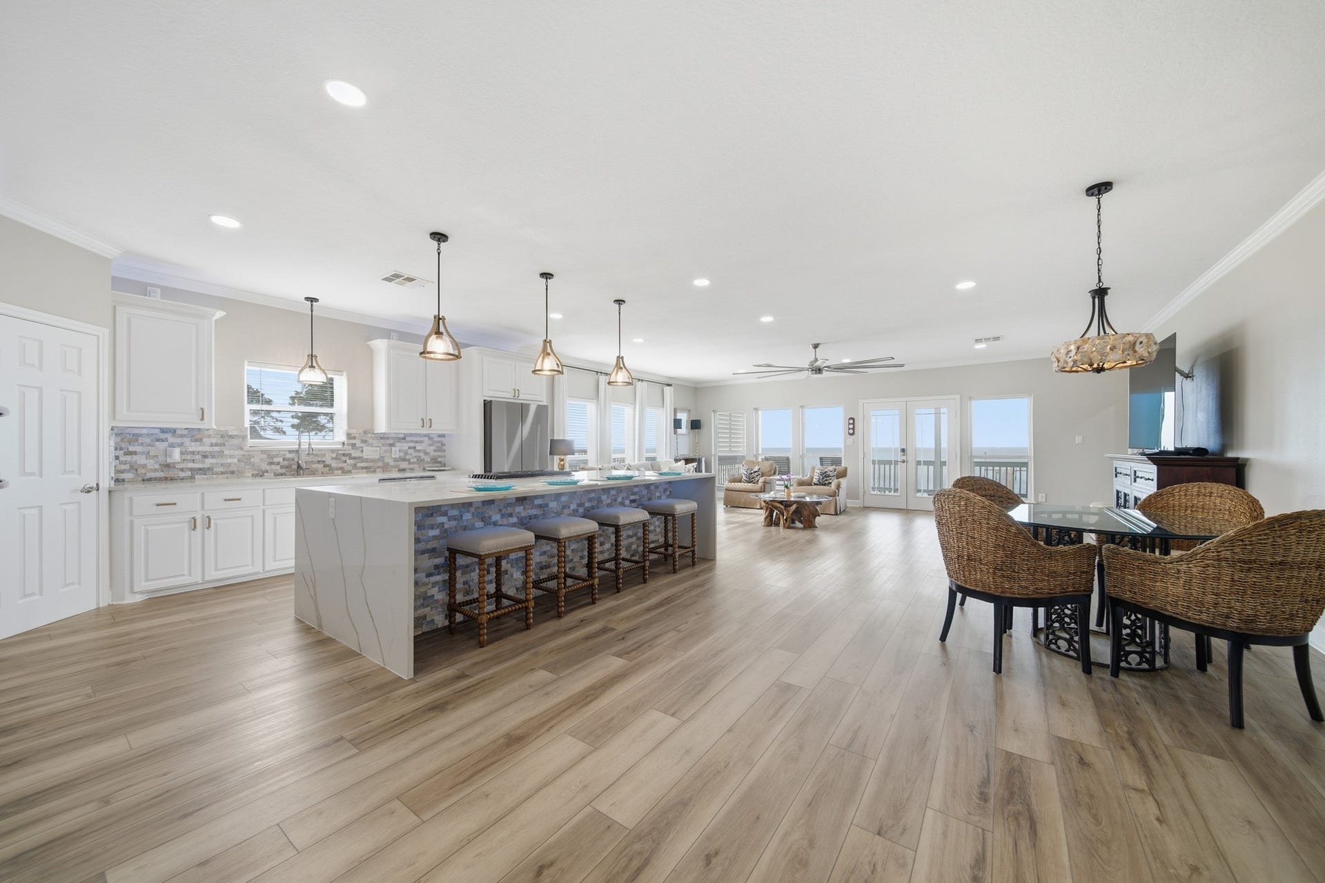 2534 Cliff Drive, San Leon, TX 77539 Gather around the magnificent 10-foot quartz waterfall island.