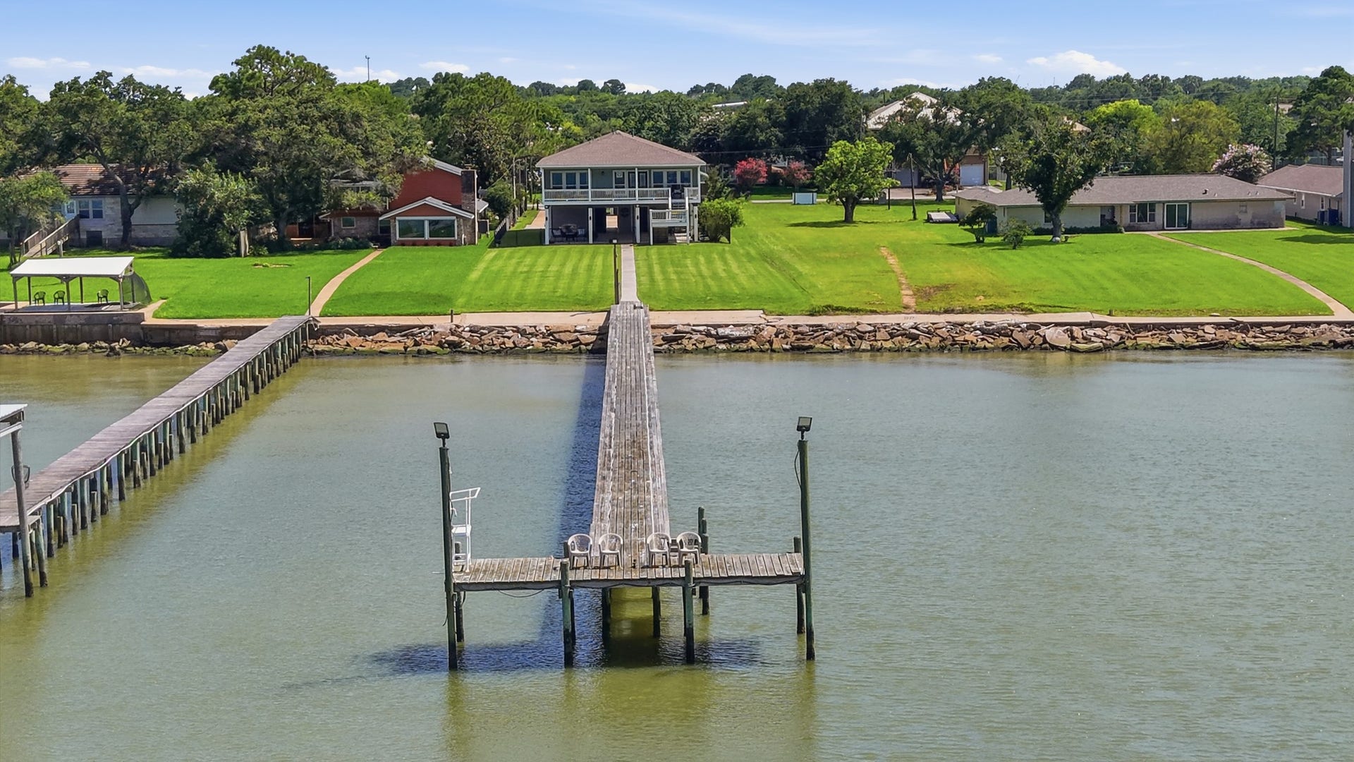 2534 Cliff Drive, San Leon, TX 77539 Walk down your private pier, completely equipped with water, electricity, and fishing lights.