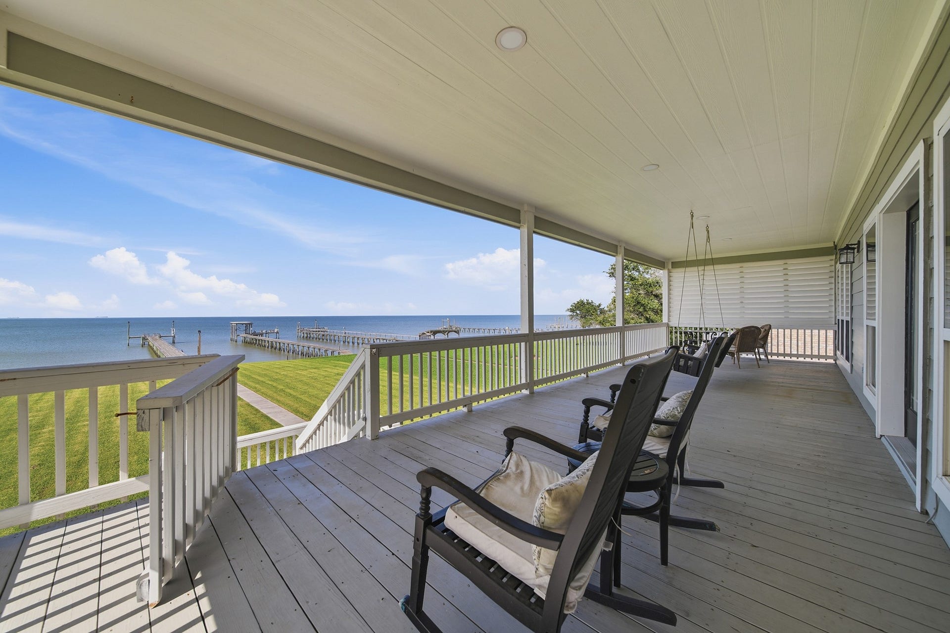 2534 Cliff Drive, San Leon, TX 77539 Take in endless, unobstructed water views from your expansive second-level terrace.