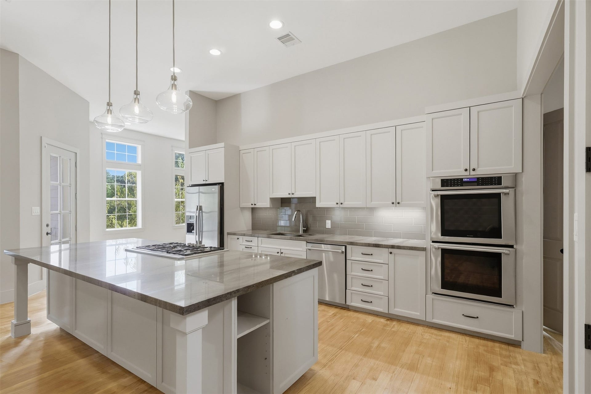 16017 Kube Court, Jersey Village, TX 77040 Kitchen with Thermador double oven and rane