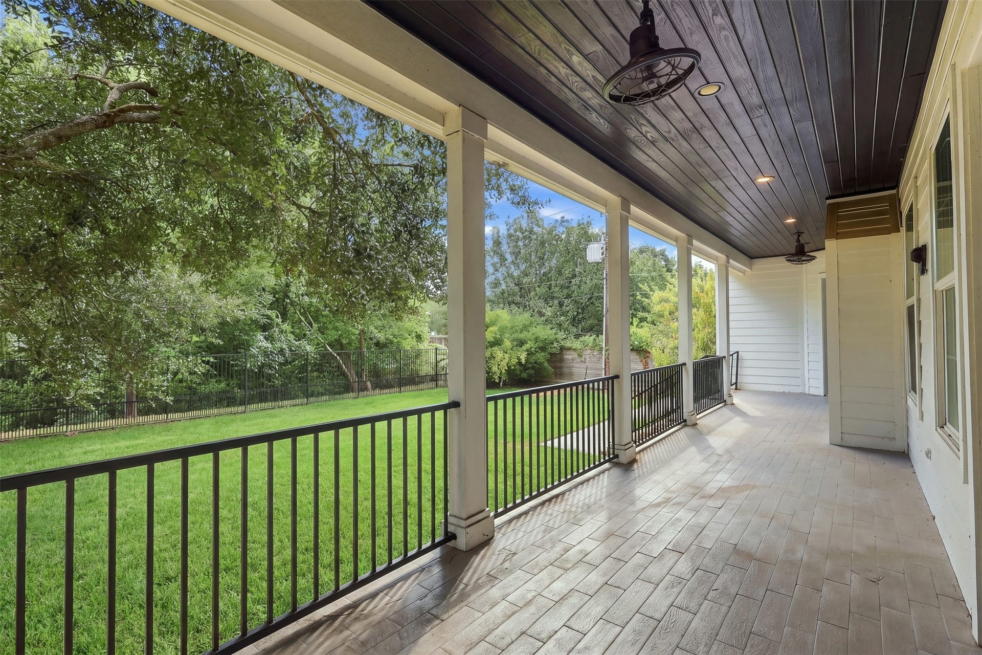 16017 Kube Court, Jersey Village, TX 77040 Amazing porch overlooking backyard with fans