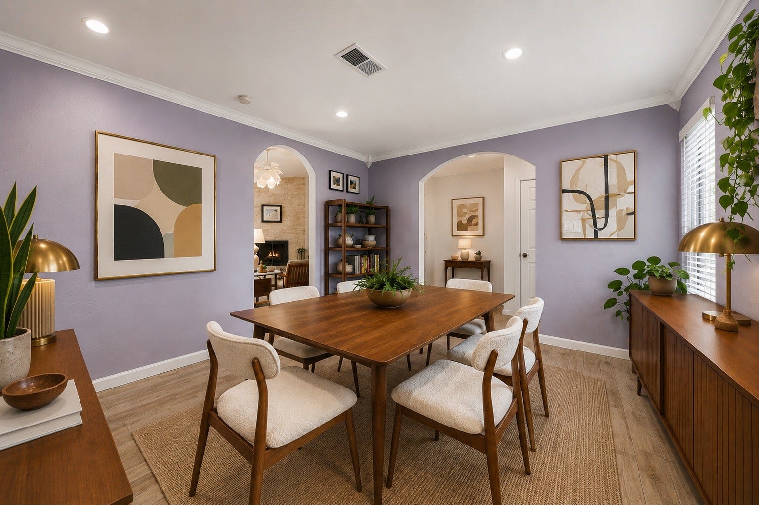 Gather with family and friends in the elegant formal dining room, featuring timeless archways, crown molding, and abundant natural light. This versatile space is ideal for hosting holiday dinners, celebrations, or can easily serve as a home office or flex room to fit your lifestyle. *Photo has been virtually staged