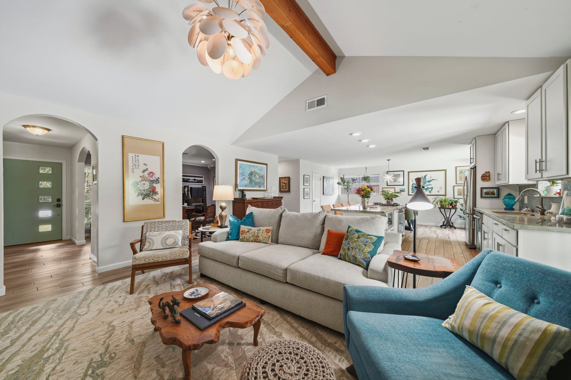 Walking in, you are greeted by a light and open space! This huge living and dining area will not disappoint and offers elevated ceilings and an abundance of natural light.
